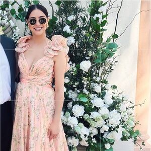 Lush ruffles and romantic details to the floaty Mac Duggal evening Gown Apricot